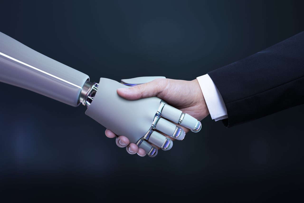 https://orientecloud.com/wp-content/uploads/2022/12/business-hand-robot-handshake-artificial-intelligence-digital-transformation-1280x854.jpg